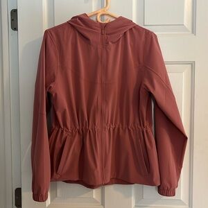 Lululemon salmon lightweight cinched waist jacket. Size 6. New without tags.